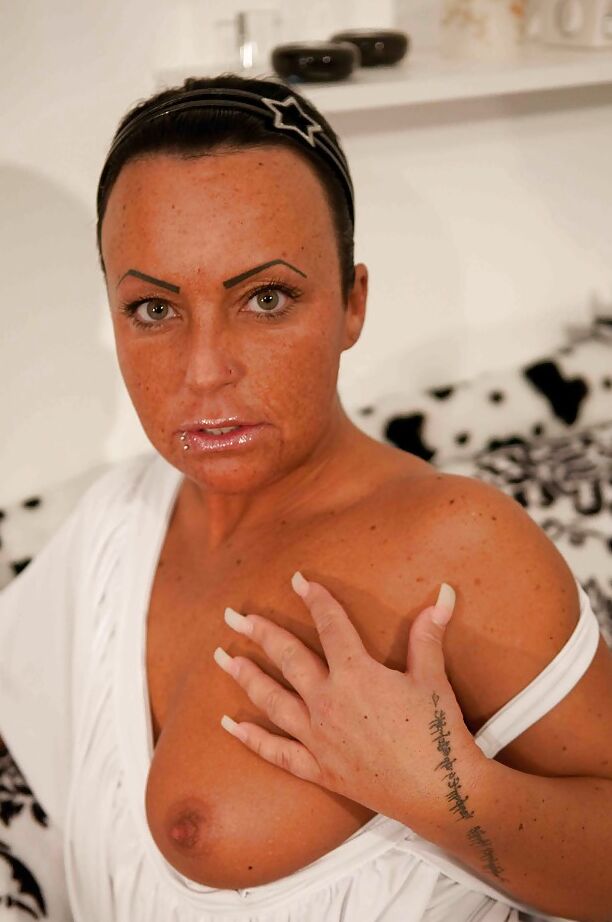 12P Mature Candy Cox flaunting her goodies while wearing designer boots