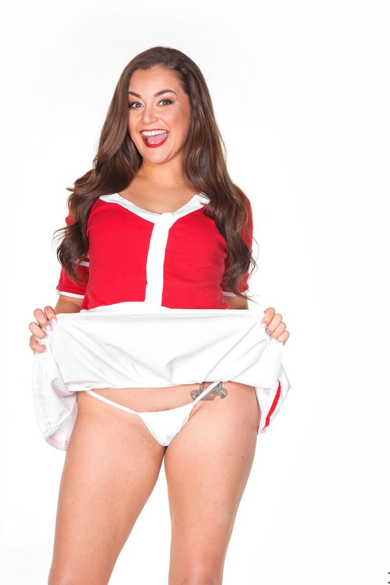 15P Petite Latina model Allie Haze exposes her phat ass as she strips in red heels