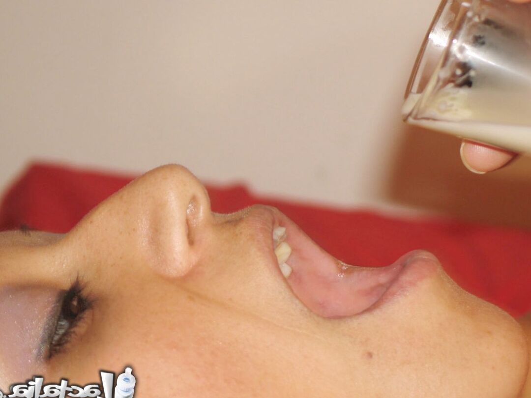 16P Cute Latina lactates into a shot glass then drinks ir