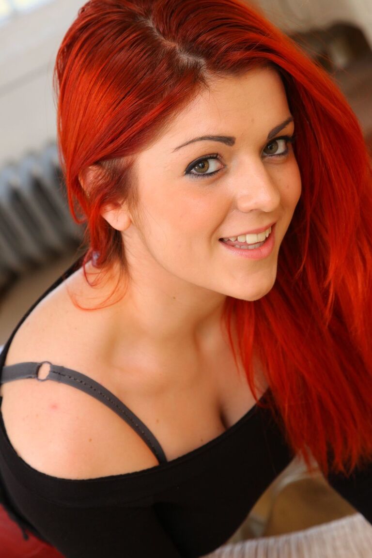 21P Redhead cutie in latex skirt Rosie Rees shows fabulous ass in hot stockings