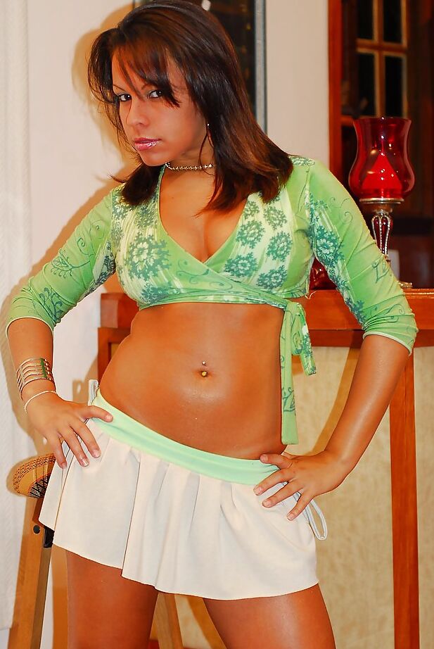 16P Steamy latina chick with big tits and ample ass getting nude
