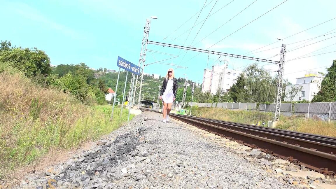 15P Blonde babe Debora pees next to railway line