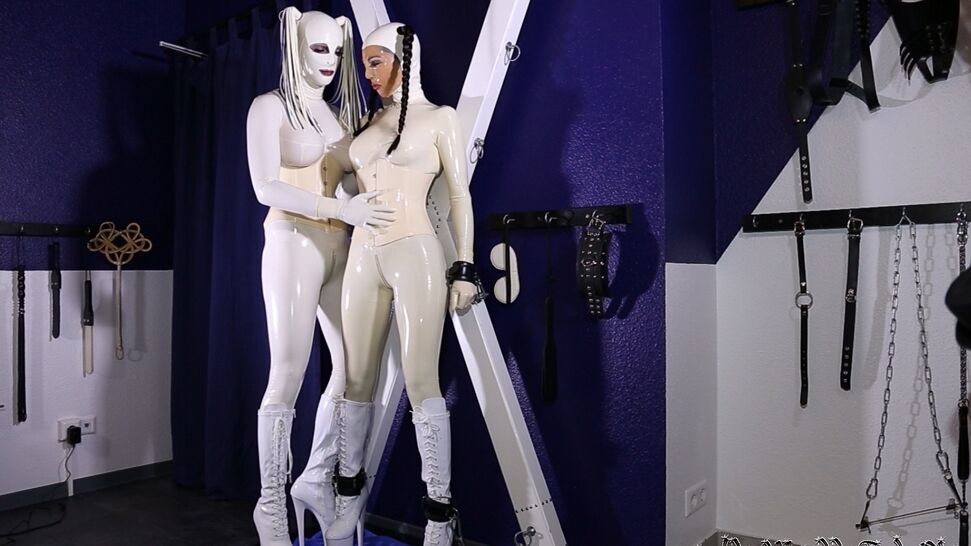 15P Kinky babe in a latex outfit Latex Lara gets her twat touched while tied up