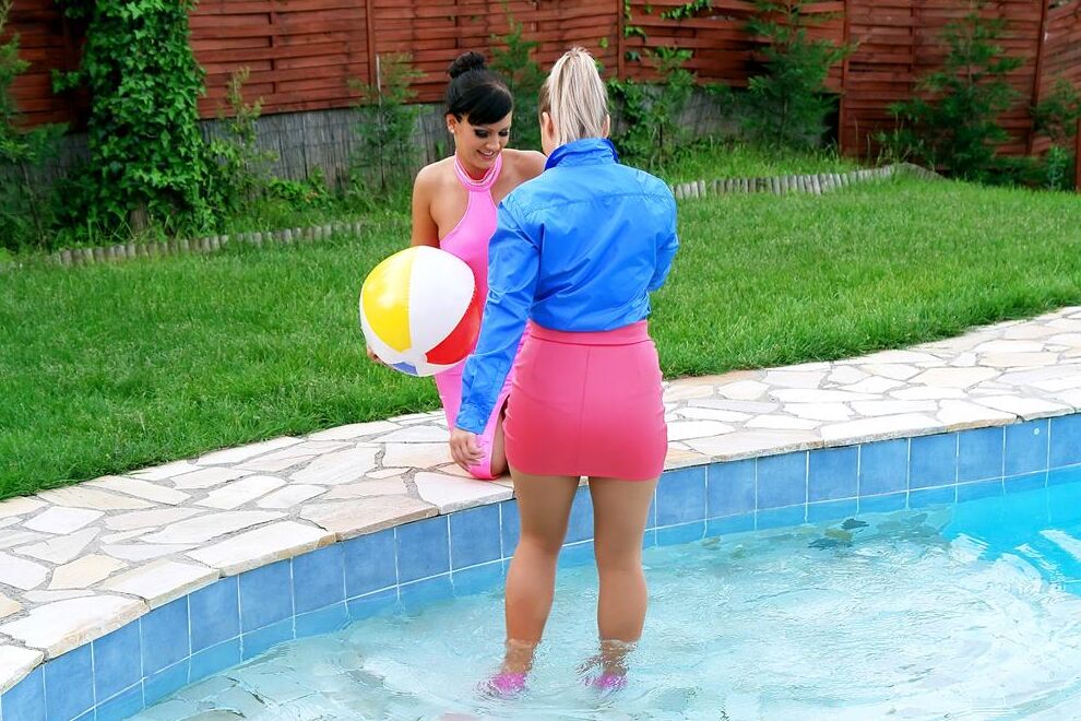 15P Fully clothed women partake in lesbian foreplay while in a swimming pool