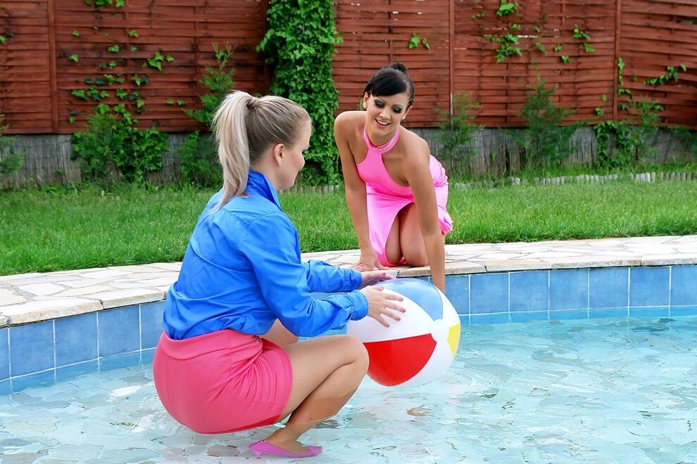 15P Fully clothed women partake in lesbian foreplay while in a swimming pool