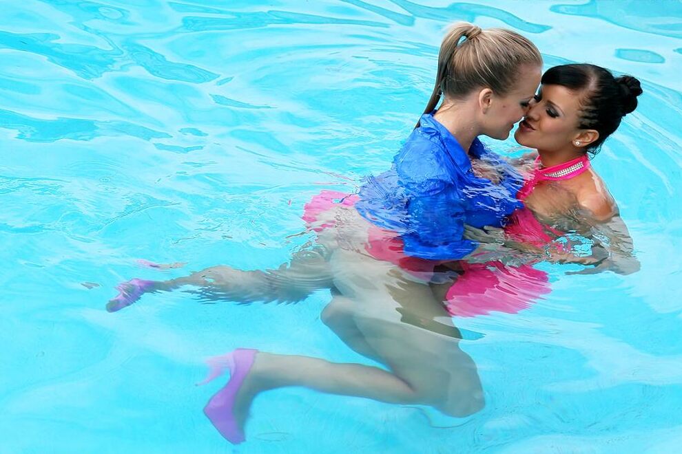 15P Fully clothed women partake in lesbian foreplay while in a swimming pool