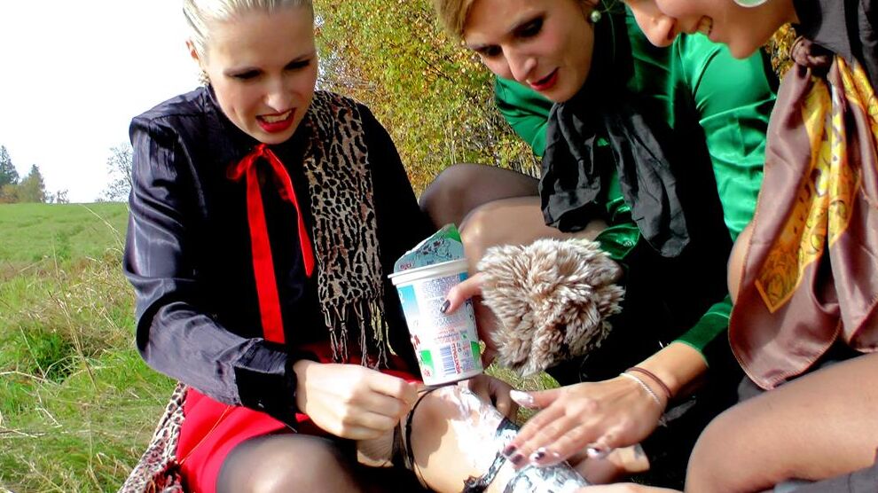 15P Clothed lesbians douse each other if food stuffs while in a field
