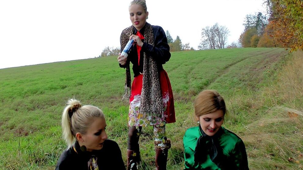 15P Clothed lesbians douse each other if food stuffs while in a field