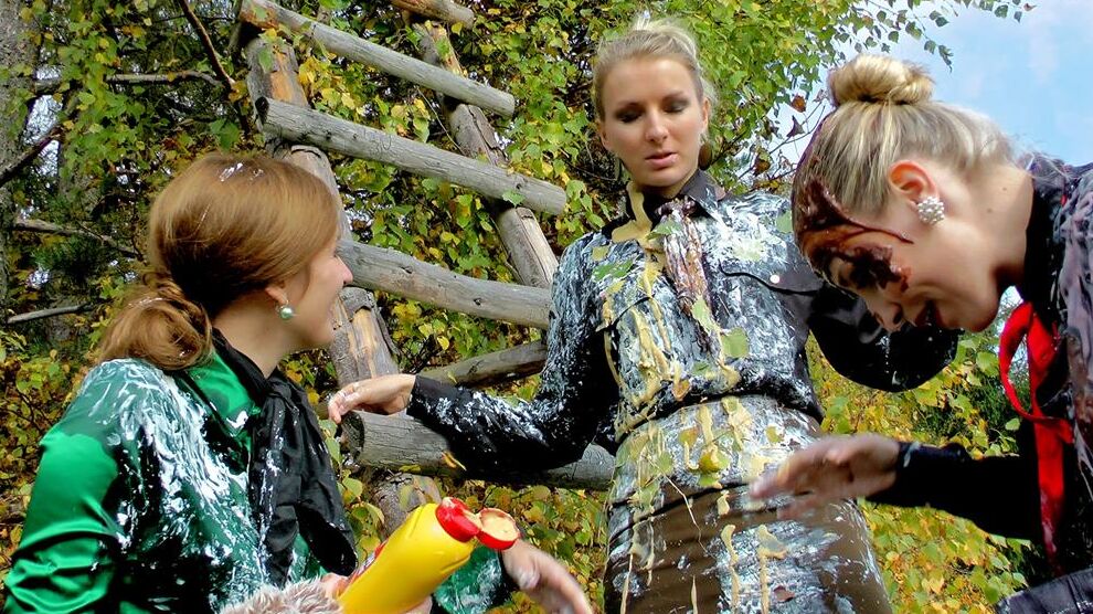 15P Clothed lesbians douse each other if food stuffs while in a field
