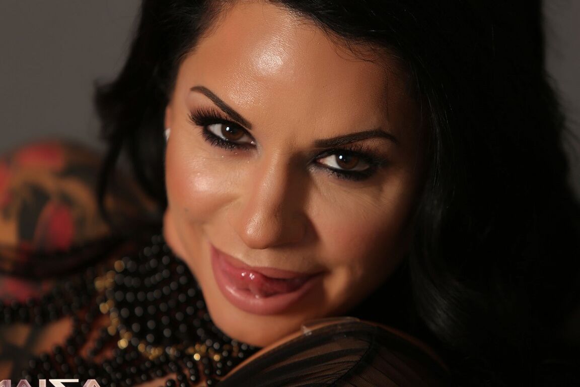 21P Stunning MILF Angela Cabrini shows her fakes and touches her soft clam