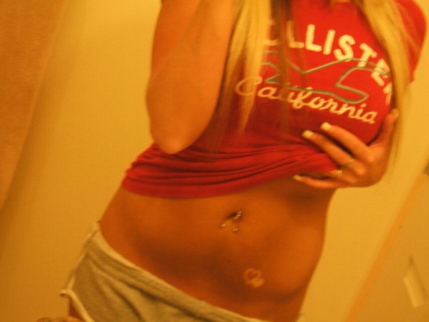 12P Monroe takes pictures of her tight round ass in tiny shorts
