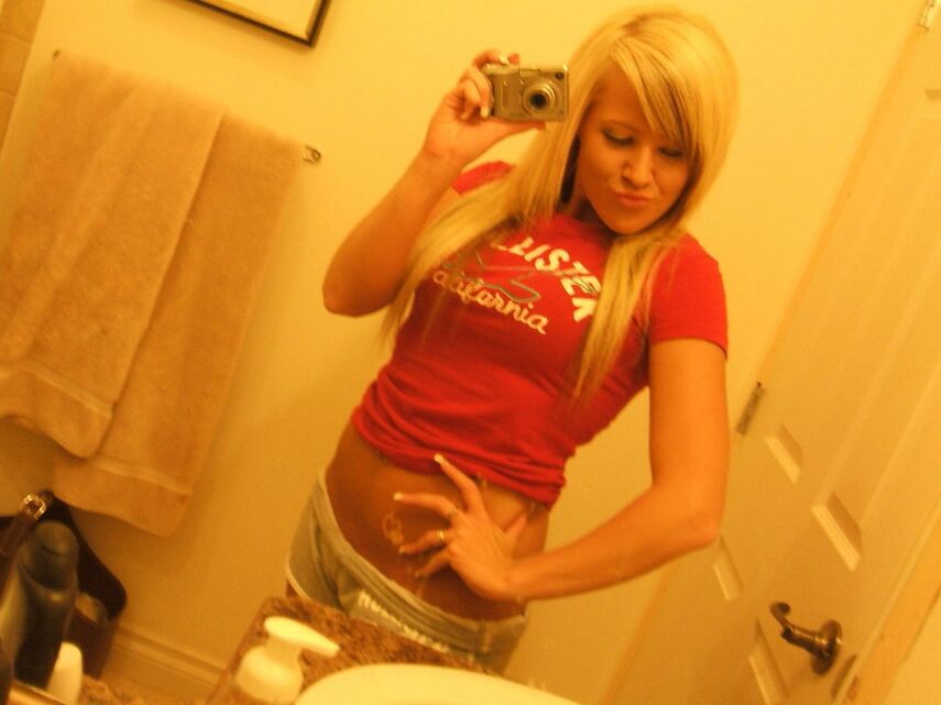 12P Monroe takes pictures of her tight round ass in tiny shorts