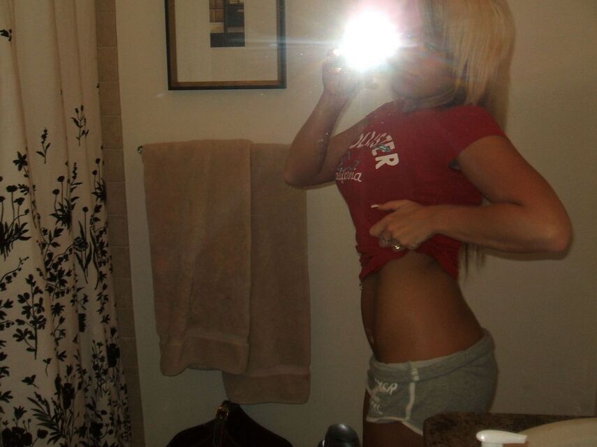 12P Monroe takes pictures of her tight round ass in tiny shorts
