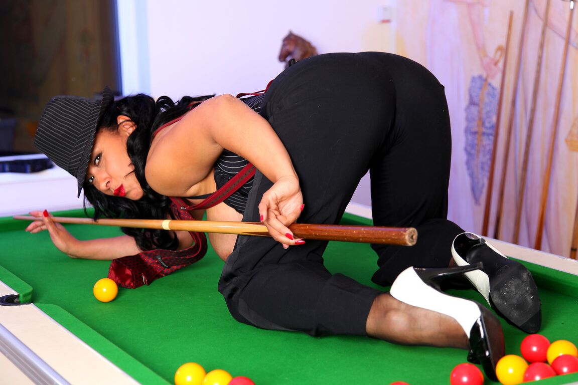 21P Curvy MILF Danica Collins exposes her bush and huge fakes on a billiard table