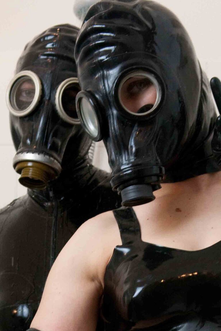 12P Amateur chick Jana Puff and a lesbian model gas masks and latex in a bathroom