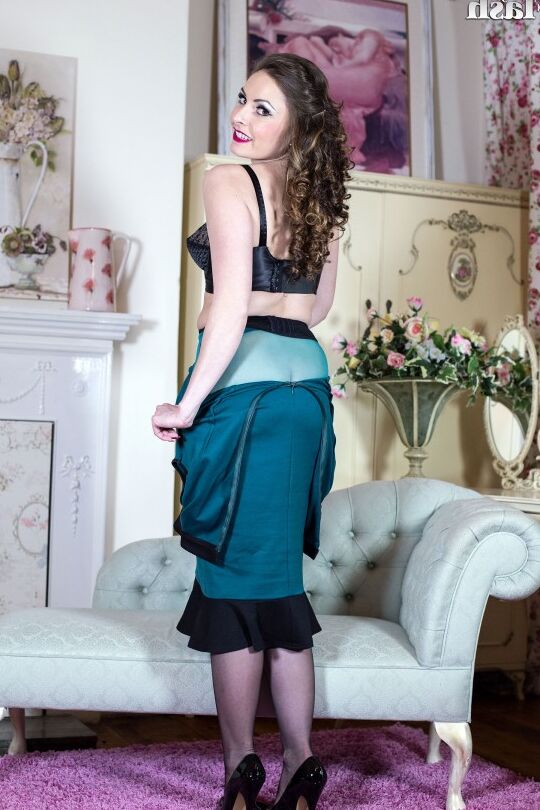 15P Sexy MILF Delane gets dresses after posing topless in nylons and garters