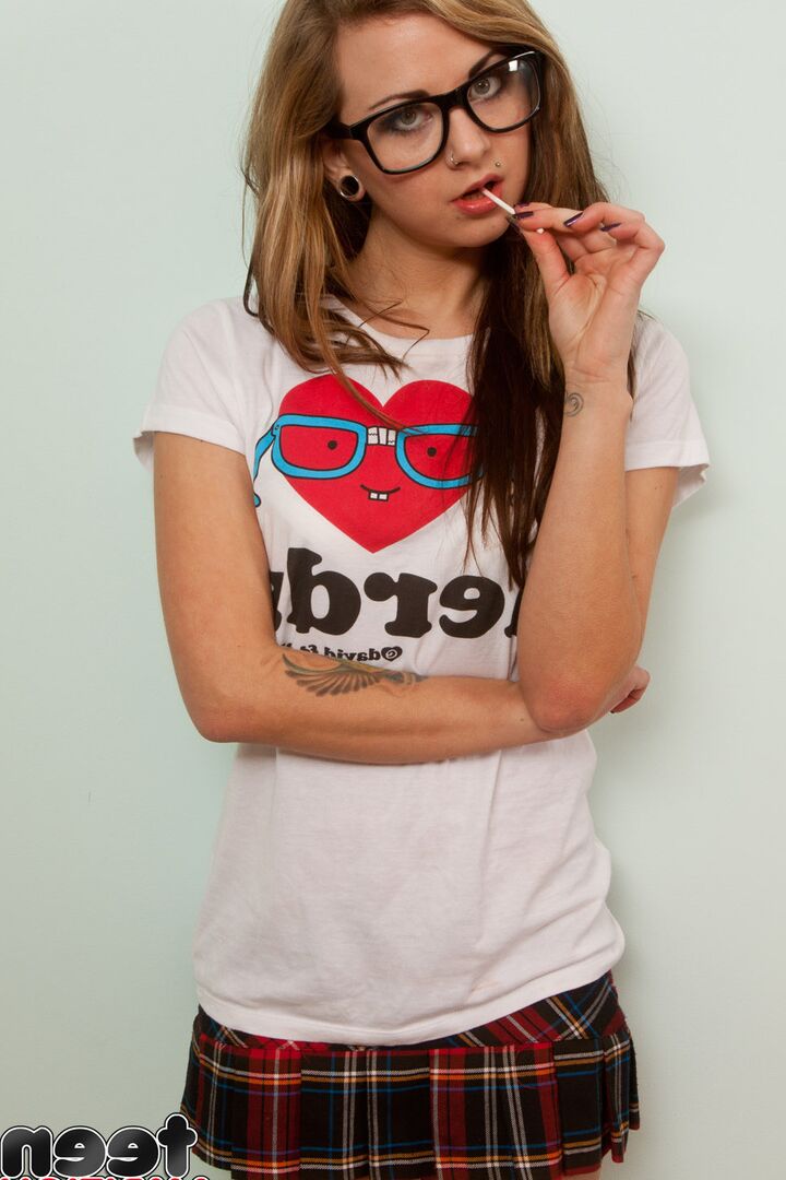 15P Nerdy teen Alexa Brooks strips to striped OTK socks and red heels on her bed