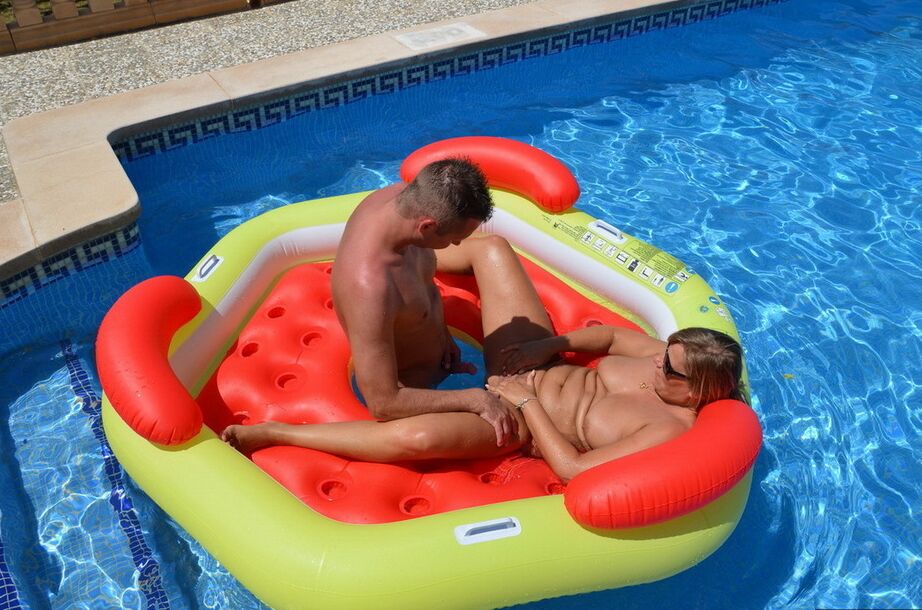 20P Naked amateur Sweet Susi gets banged on an inflatable craft in a pool