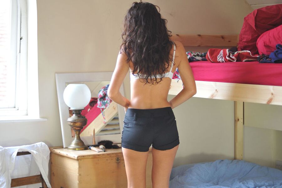 15P Solo girl Nicola Rocco touts her ass in booty shorts before getting undressed