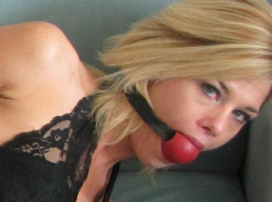 15P Blonde chick is silenced with gags while hogtied in denim cutoffs and heels