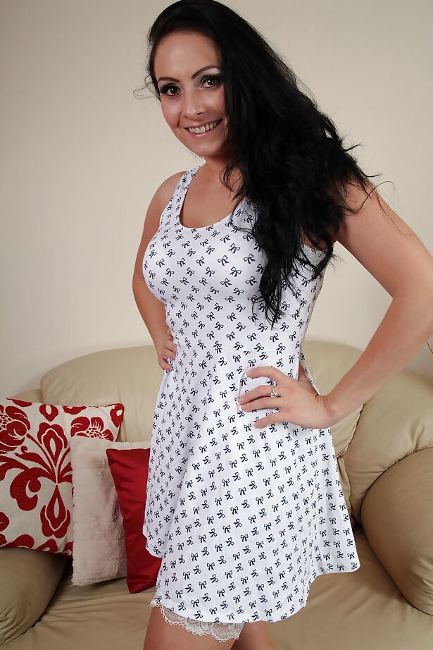 16P Smiley MILF in nylons strips down to expose her tempting curves and sexy feet