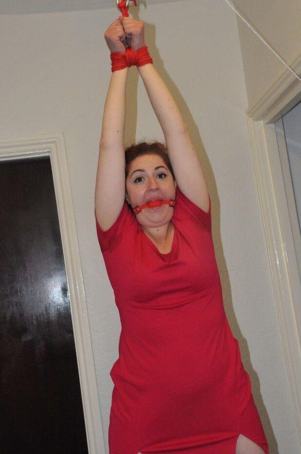 16P Clothed woman finds her big ass exposed while restrained and gagged
