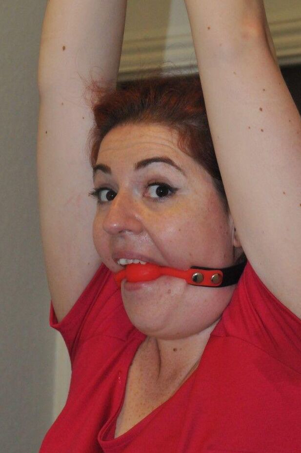 16P Clothed woman finds her big ass exposed while restrained and gagged
