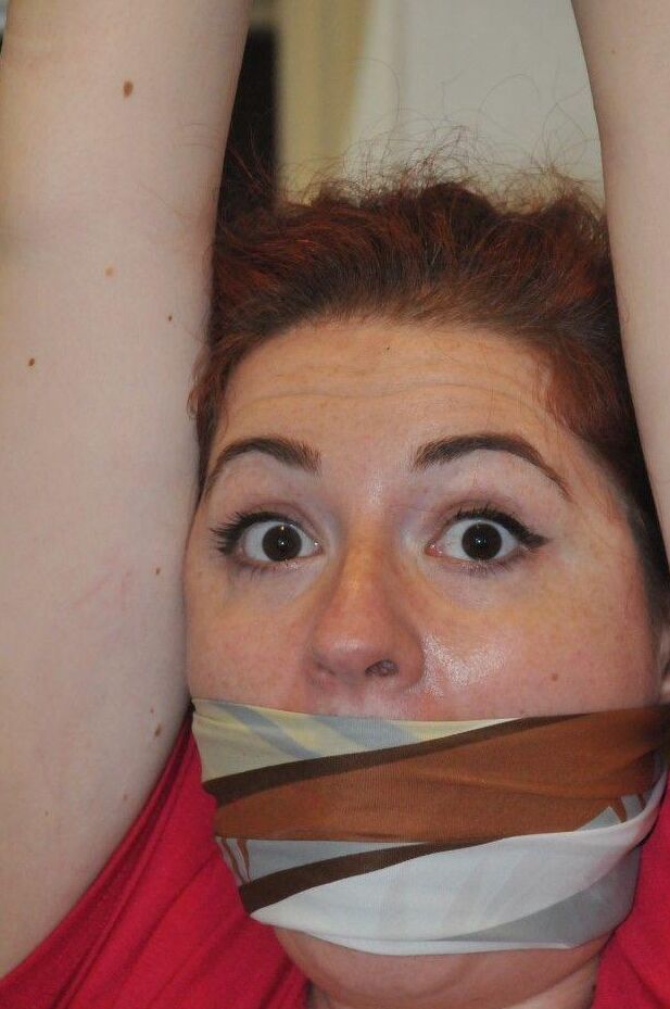 16P Clothed woman finds her big ass exposed while restrained and gagged