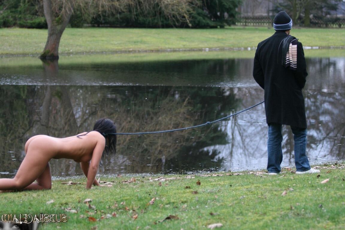 13P Female sub Barbara Devil crawls on a leash before being flogged on a cold day