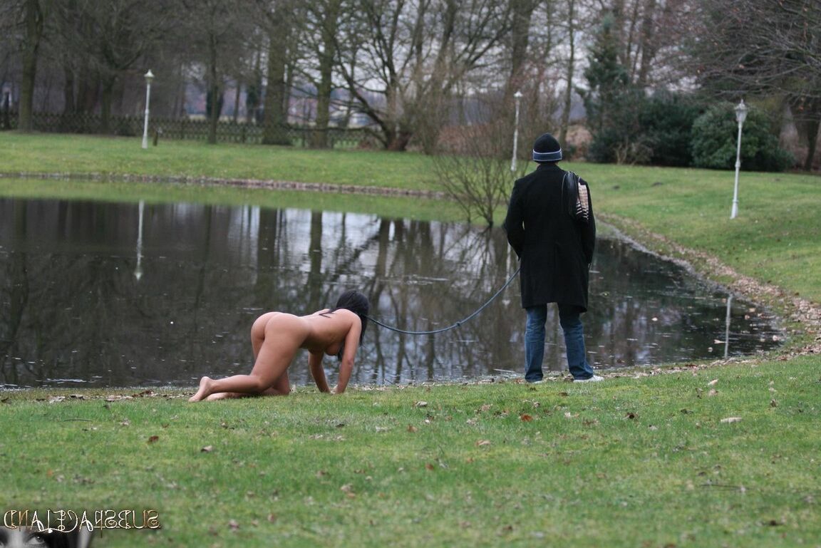 13P Female sub Barbara Devil crawls on a leash before being flogged on a cold day