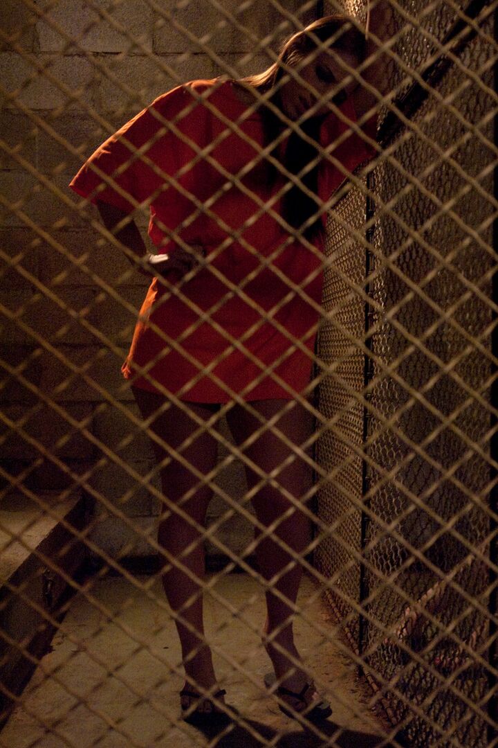 17P Jailed chicks change into revealing clothing at the insistence of prison guard