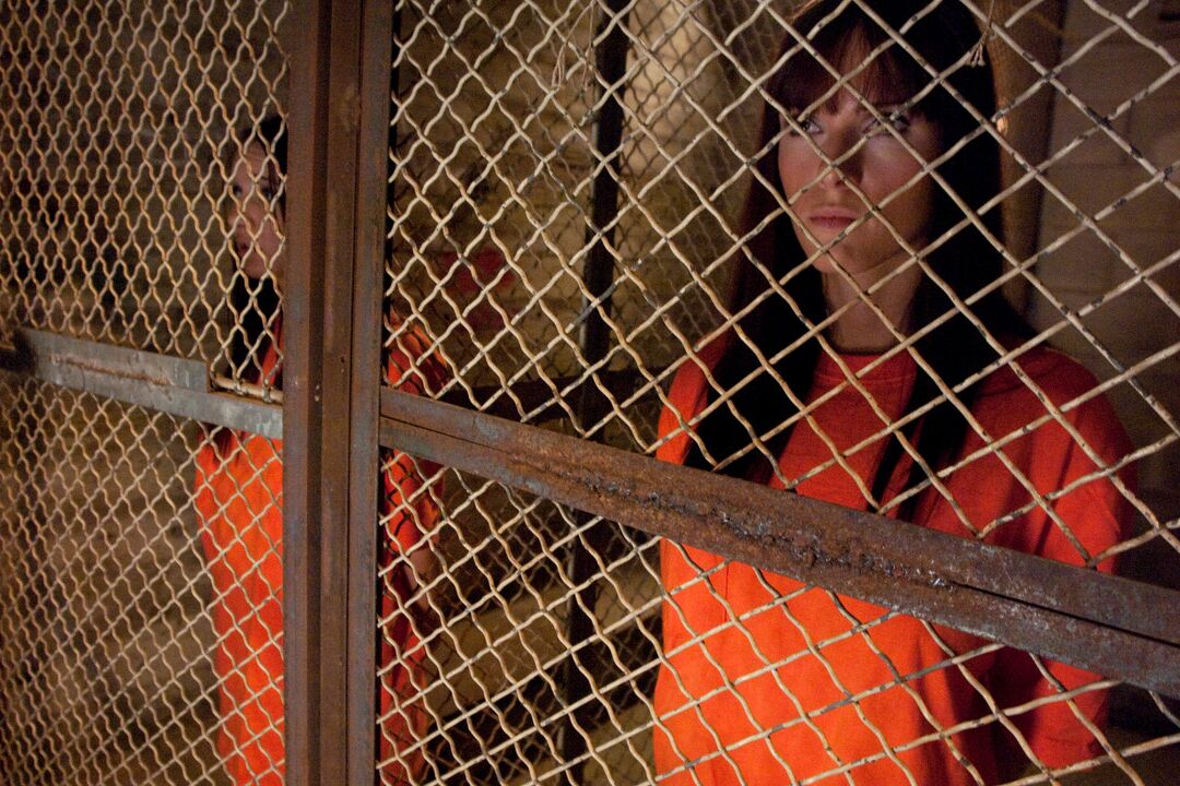 17P Jailed chicks change into revealing clothing at the insistence of prison guard