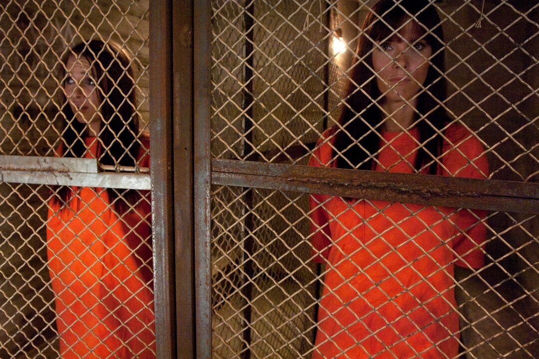 17P Jailed chicks change into revealing clothing at the insistence of prison guard