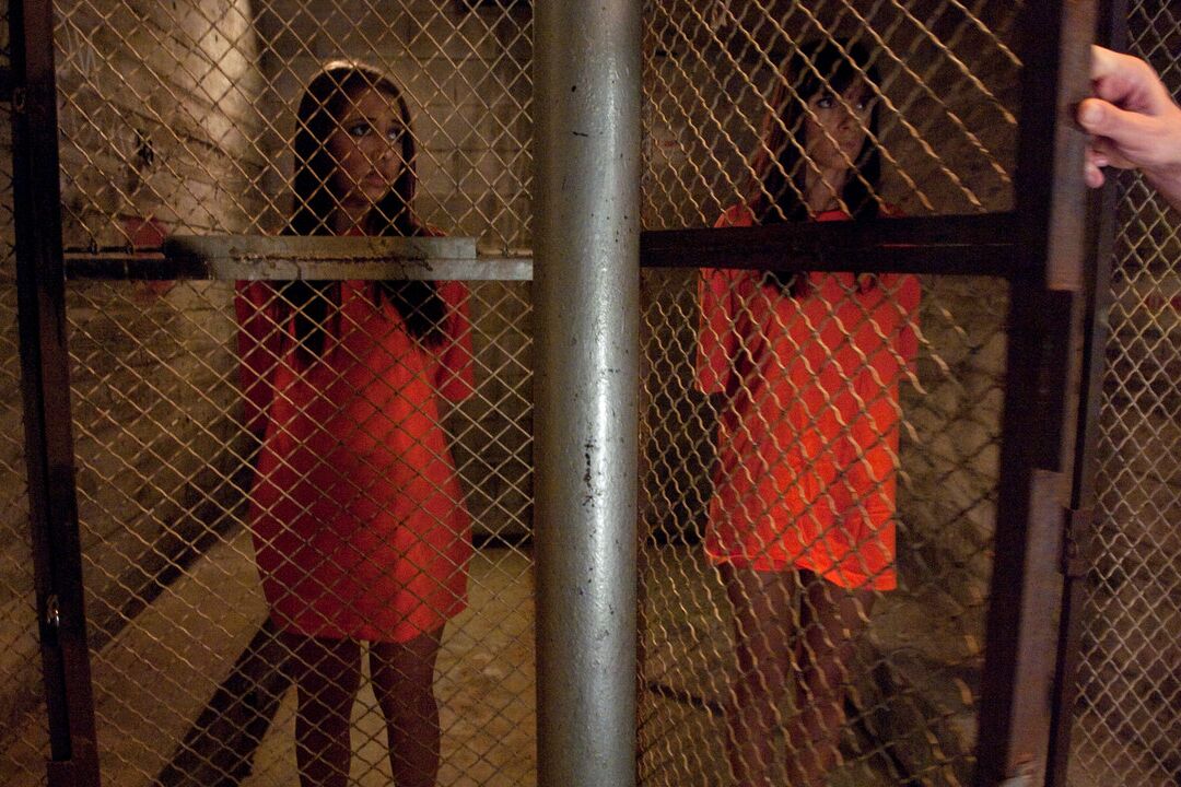 17P Jailed chicks change into revealing clothing at the insistence of prison guard