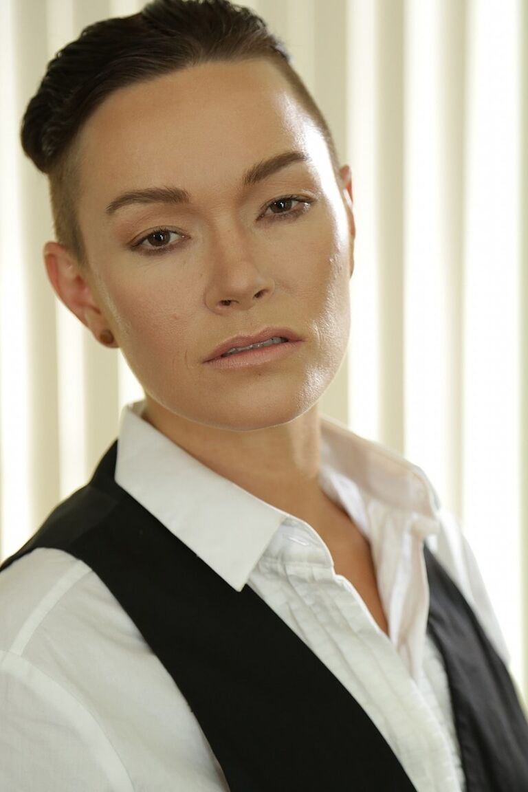 20P Androgynous short haired model Jiz Lee posing in her male outfit