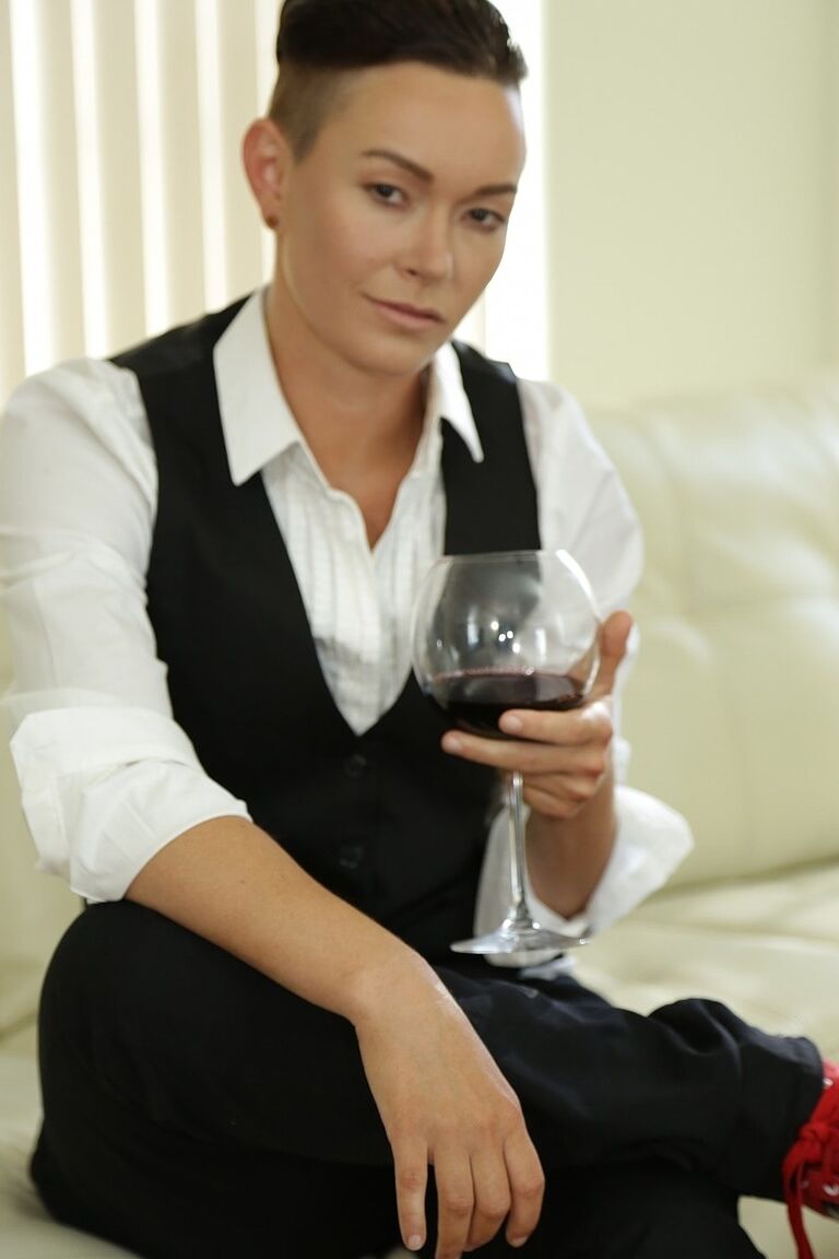 20P Androgynous short haired model Jiz Lee posing in her male outfit