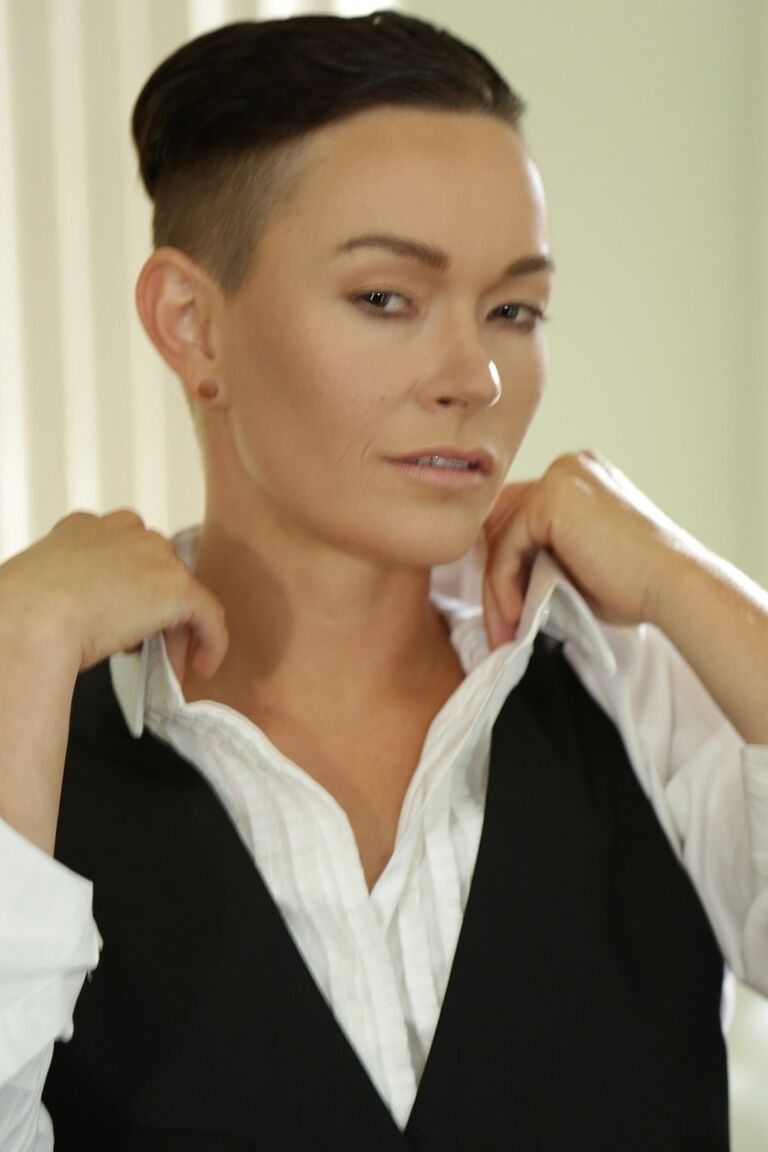 20P Androgynous short haired model Jiz Lee posing in her male outfit