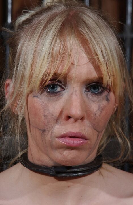 16P Blonde chick Sarah Jane Ceylon is restrained in a variety of ways in a dungeon