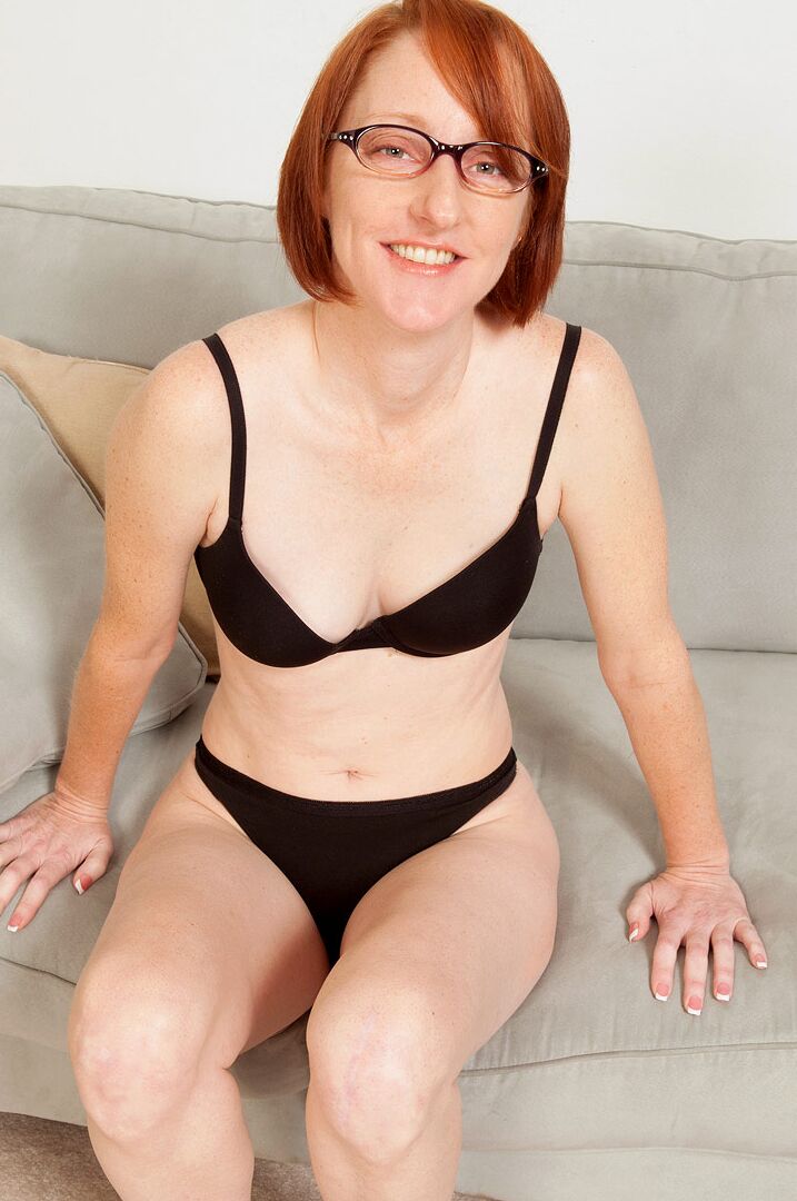 16P Older redhead Layla Redd takes off her jeans on way to posing nude