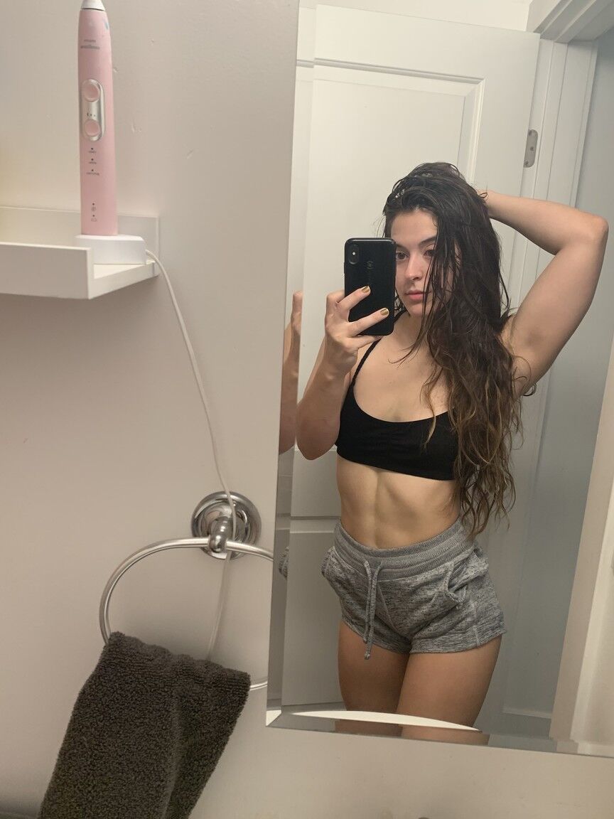 12P Solo model Abbie Maley takes mirror selfies while getting completely naked