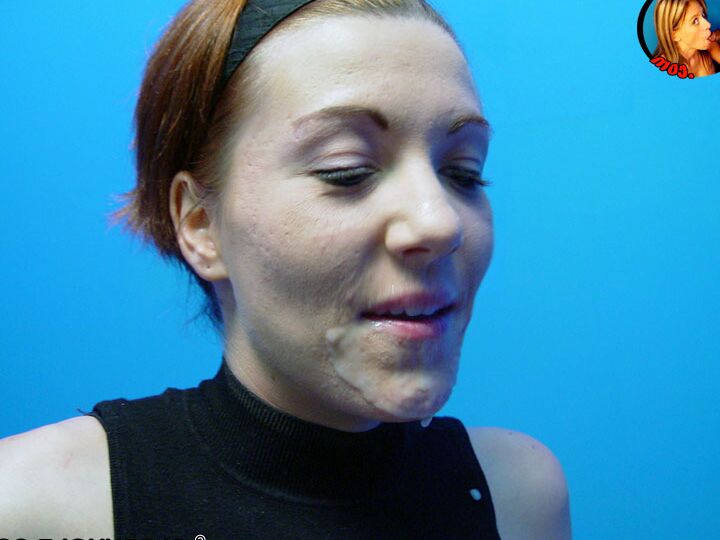 17P Redheaded chick Alisha Angel gets on her knees to blow a BBC at a gloryhole