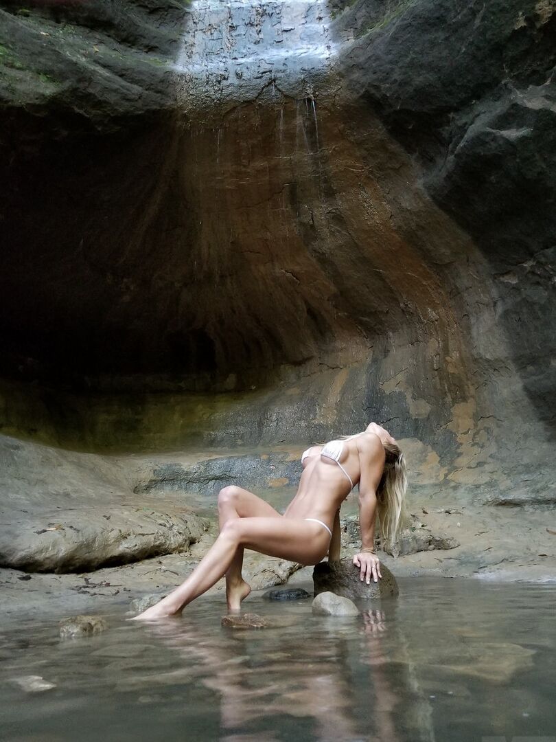 15P Blond amateur Meet Madden strikes hot solo poses in a bikini after backpacking