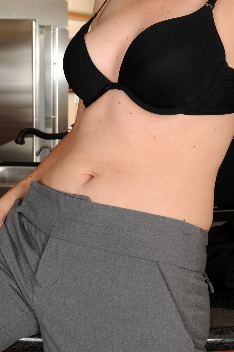 21P Sexy black haired mature Beth M exposes her twat and rubs it in a solo