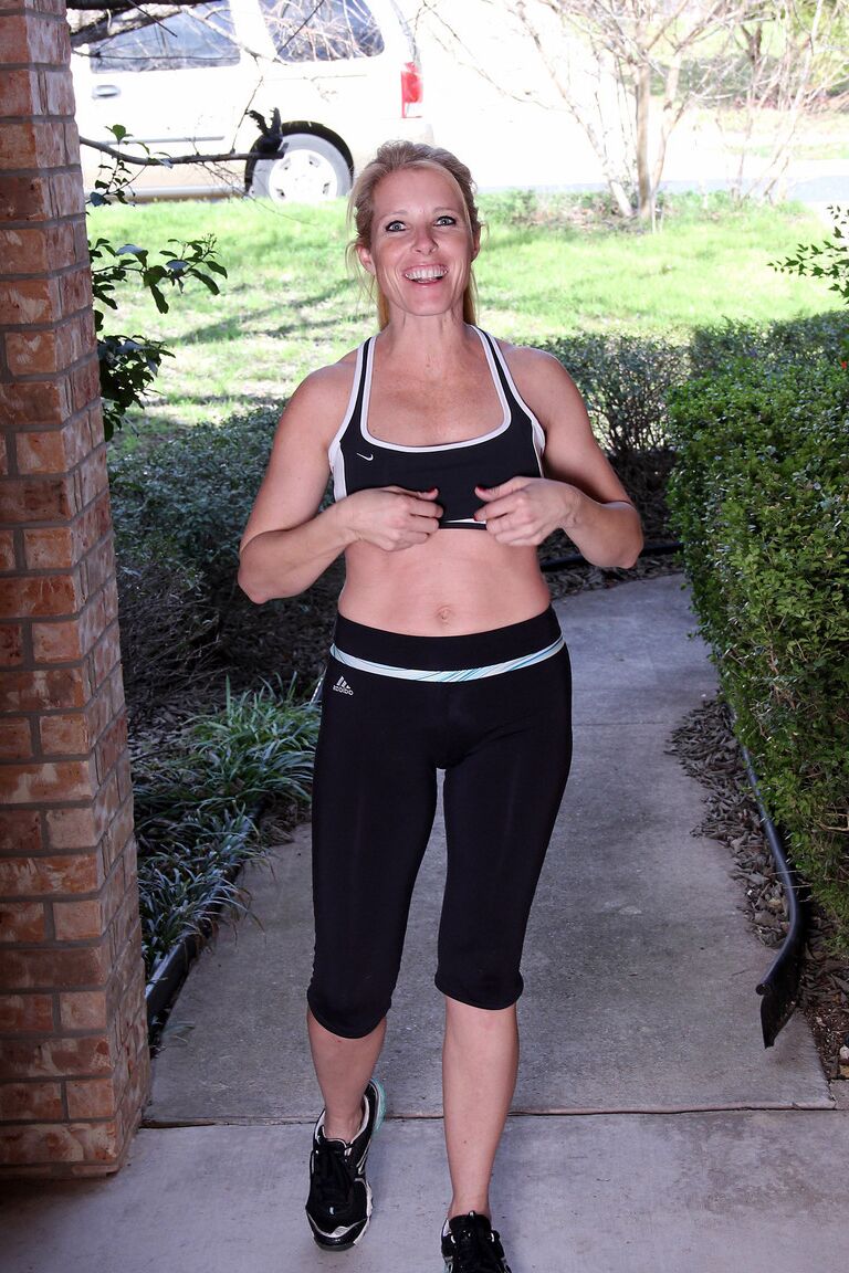 21P Fit mature ginger Gail displaying her meaty shaved clit at the gym