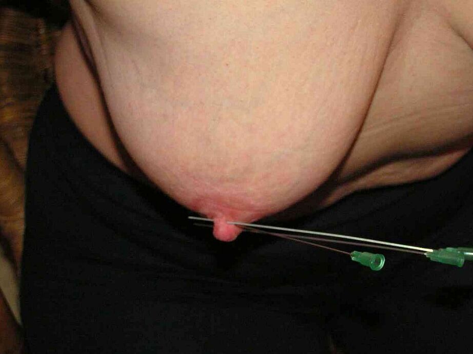 12P Restrained blonde lady has her nipples clamped and pierced with needles
