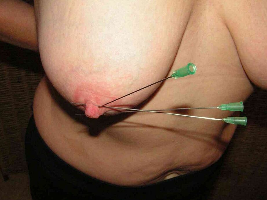 12P Restrained blonde lady has her nipples clamped and pierced with needles