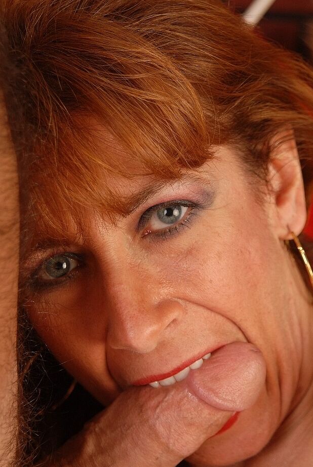 16P Aged redhead Mikela eats jism off of face after taking money shot
