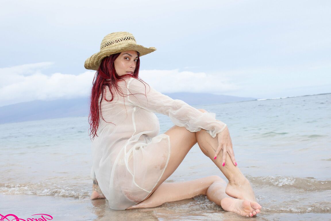 17P A beautiful day at the beach in my see thru shirt playing in the water