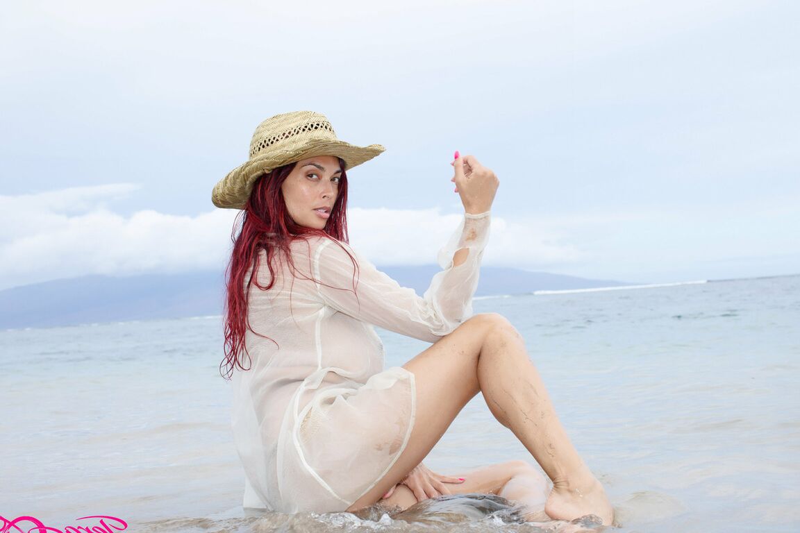 17P A beautiful day at the beach in my see thru shirt playing in the water