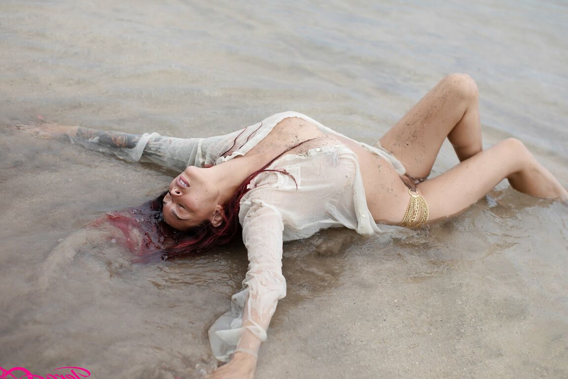 17P A beautiful day at the beach in my see thru shirt playing in the water